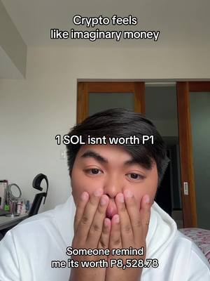 A close-up shot features a young man with a surprised expression, his hands covering his mouth. The background is blurred, with text overlays at the top and bottom of the image. The man is wearing a white shirt, and the lighting appears to be natural.