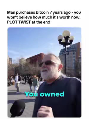 The cover image shows a man speaking into a microphone, set against an outdoor backdrop with other people and buildings. Text overlays the image as if a video is being played and the viewer can find out a plot twist in the end. The main color tones are natural, with the man in sunglasses and a dark shirt.