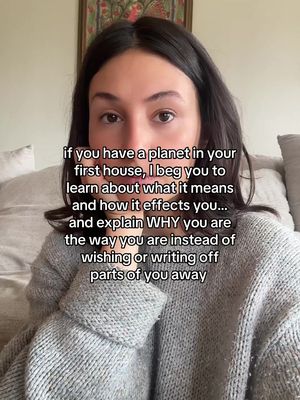 The cover image shows a young woman in a selfie-style shot. She's positioned in the center with text overlayed on the screen. She's wearing a cozy gray sweater, has dark hair and a neutral expression. The background appears to be a room with a framed picture.