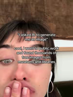 The image is a selfie-style close-up featuring a young person with dark hair, positioned to the side. The person is looking downwards and slightly towards the camera with visible text overlay. The background is out of focus and has an element of wood panel.