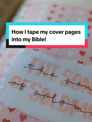 The cover image shows a Bible opened to a decorated page. In the upper left corner, a rectangular text overlay in shades of blue, white, and red states, 'How I tape my cover pages into my Bible!' Below this, a page is decorated with words from 'The Song of Solomon', written in a mix of black script and salmon-colored block letters. The background includes hearts in the same salmon color.