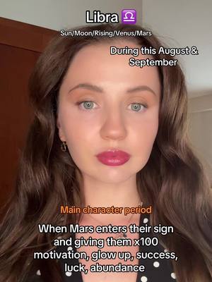 A selfie-style shot featuring a woman with brown hair, fair skin, and pink lipstick. The background is subtly blurred. Text overlays are present, mentioning 'Libra' and related astrological information.