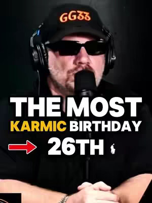 The cover image features a man wearing sunglasses, a black cap with the letters 'GG33,' and headphones, positioned in front of a microphone. Text overlays emphasize the topic: 'THE MOST KARMIC BIRTHDAY' with '26TH' highlighted, accompanied by an arrow. The background is dark.