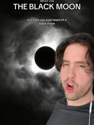The cover image features a man in the foreground with a black moon and cloudy sky in the background. The text "THE BLACK MOON" is overlaid at the top of the image.