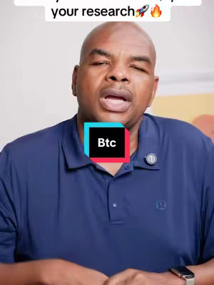 A middle-aged Black man with a shaved head is the focus, dressed in a dark blue polo shirt. Behind him is a neutral backdrop, with a sign in the background. A colorful box with "Btc" is superimposed on the man's chest. The text overlay is top-aligned, reading "your research".