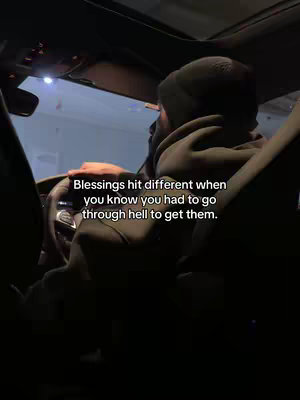 The cover image shows a person driving a car at night. Head and shoulders are visible. Text is overlaid on the image which reads, 'Blessings hit different when you know you had to go through hell to get them.'