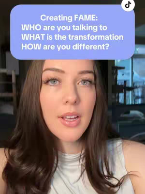 A woman with long brown hair is centered in the image, looking directly at the camera and speaking. Overlaid on the image is a light blue rectangle containing white text about fame, the transformation, and how the creator is different. The background appears to be a dimly lit interior.