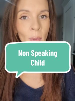 A woman's face with long brown hair is centered, with a teal speech bubble overlay containing white text that reads "Non Speaking Child". The woman has fair skin, light eye makeup, and is looking slightly towards the camera. The background is slightly blurred, suggesting an indoor setting.