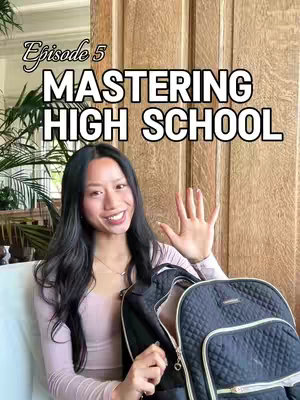 The cover image features a young Asian woman smiling and waving, with long black hair. She is holding a black backpack, with a partial view of the interior. The image has text overlays that indicates the video is Episode 5 of a series titled "Mastering High School". The background is a blurred view of a wooden wall.