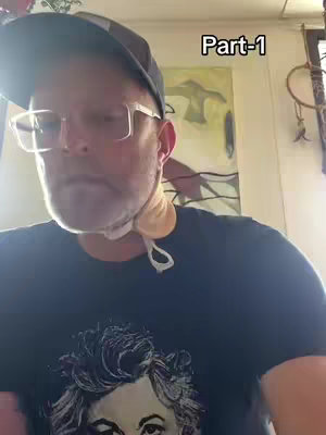 The cover image features a man wearing glasses, a baseball cap, and a dark t-shirt. The text "Part-1" is in the top right.