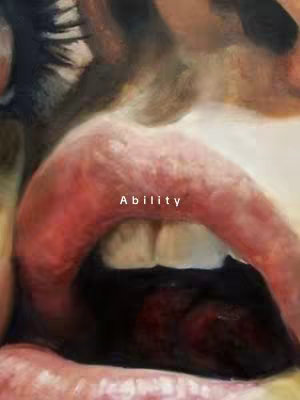 The image is a close-up of a person's open mouth. The focus is on the red lips and visible teeth, with the interior of the mouth appearing dark. The word "Ability" is written in white font above the open mouth.