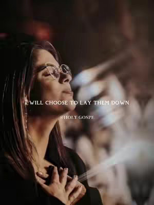 The cover image features a medium shot of a woman with glasses looking upwards with a serene expression. Text overlays are added to the image. The background is blurred with warm tones.