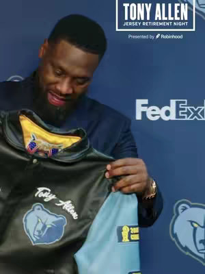 An individual, presumably Tony Allen, is shown holding a customized jacket, and the background includes a dark blue backdrop with white text stating 'TONY ALLEN - JERSEY RETIREMENT NIGHT' and the Robinhood logo, plus the FedEx logo on the right. The person is smiling, and the overall composition suggests a celebratory event, like a jersey retirement.