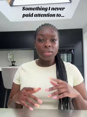 A woman in a light yellow t-shirt is in the middle of the image, with a white and black background behind her. The text "Something I never paid attention to…" is overlaid at the top of the image.