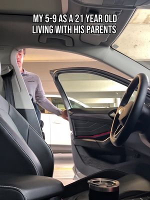 The cover image shows the inside of a car with the driver's side door open, next to a parking garage. The creator, a young man, is partially visible, holding the opened door. Text overlaying the picture reads, "MY 5-9 AS A 21 YEAR OLD LIVING WITH HIS PARENTS."