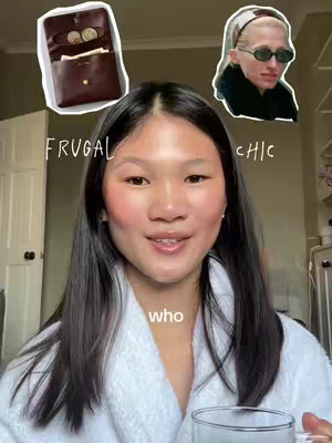 A selfie-style image featuring a young woman with long, dark hair and a light-colored bathrobe. She has rosy cheeks and is smiling. Two cartoon-like images are placed above her head: one is a brown wallet with coins and bills, the other is a woman wearing sunglasses and a headscarf. Text overlays read 'FRUGAL', 'CHIC', and 'who'.