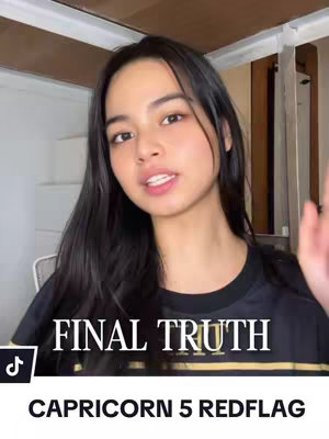 A young woman with long dark hair is centered in the frame, facing the camera and talking. Above her, there's text that says "FINAL TRUTH". Below, it says "CAPRICORN 5 REDFLAG". The background is a blurred room. The lighting is soft.