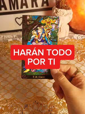 A hand holding a tarot card, with a red rectangular overlay that says "HARÁN TODO POR TI". The card itself depicts two figures holding cups, set against a backdrop of trees and golden accents.