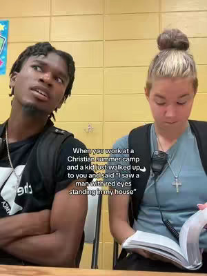 A split-screen image featuring two individuals, one male and one female, in what appears to be an indoor setting with yellow paneling. The male, positioned on the left, is looking slightly upward with a thoughtful expression. The female, on the right, is focused downwards, holding a book or notebook. Text overlay is present, providing context to the scenario.