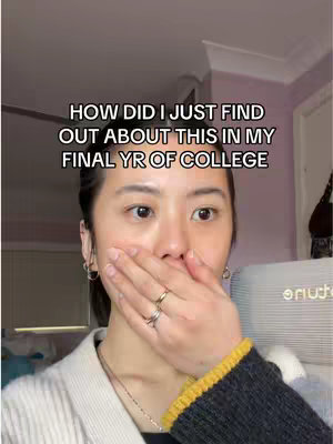 A close-up shot of a woman covering her mouth with her hand, looking surprised. Text overlays the image.