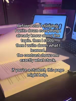 An open book with text overlay describing a study method, a timer on tablet and a laptop in the background.