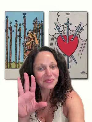 A woman with long curly brown hair is in the foreground, holding out her right hand. Behind her are two tarot cards. The card on the left features a person holding a long staff. The card on the right has a red heart pierced by three swords.