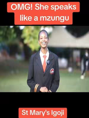 The cover image shows a medium shot of a young woman in a black blazer, white shirt, and red tie, positioned against a blurred background. Above her, a red bar displays white text. Below her, a red bar displays white text.