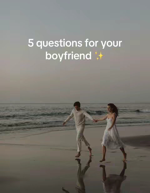 A serene image of a couple walking hand-in-hand on a beach at dusk. The sky transitions from light blue to soft orange, reflecting on the wet sand. The couple, a man and a woman, are silhouetted against the water, and the hook text '5 questions for your boyfriend' is styled in white, centered at the top.