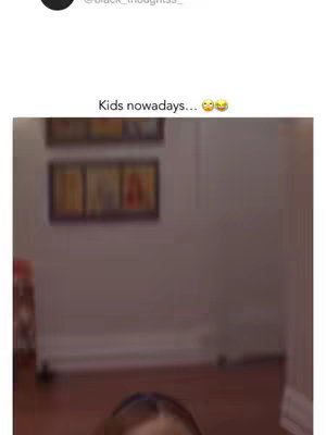 The cover image features a room interior. The room has dark wooden floors and a pale white wall. Some blurry frames are hanging on the wall. The image is poorly lit. A person is visible at the bottom of the frame.