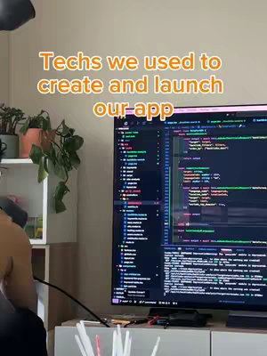 A person is in front of a computer screen displaying code, with text overlayed on the image. The overall composition includes shelves with plants in the background.