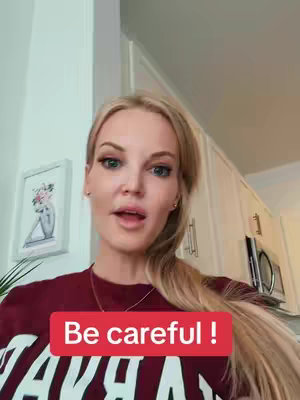 A woman with blonde hair and fair skin speaks to the camera, with a red text box that says, "Be careful!" in front of her.
