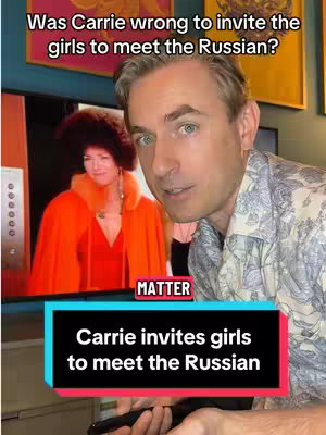The cover image features a man looking directly at the camera in a selfie perspective. Behind him, a television displays a scene from a show, which has a woman wearing an orange coat. The man is in a button-down shirt. The bottom part of the image has a black box with the text in white. There are frames and a cabinet that make up the background of the image.