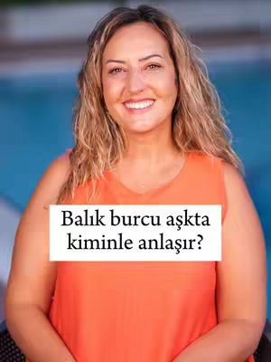 A woman with light brown hair and an orange top smiles at the camera. A white rectangular box overlay features the text "Balık burcu aşkta kiminle anlaşır?".  The background shows a swimming pool.