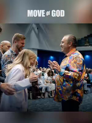 The cover image shows a lively scene from a religious gathering. In the center, a man with a colorful patterned shirt is smiling and gesturing. To his left, a woman and another man are present, their expressions suggesting engagement. A crowd of people is visible in the blurred background, seated and watching. The text overlay reads "MOVE of GOD".