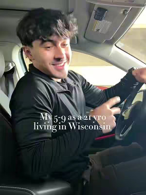 A young man is shown sitting in the driver's seat of a vehicle, smiling and looking at the camera. The cover image is centered on the person with visible elements of the car interior, including the steering wheel, the dashboard, and the side windows. The color palette is muted, with the focus on the person's expression and the text overlay.