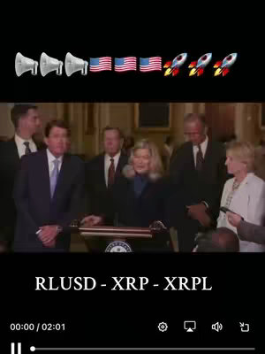 The cover image shows a group of people, including Senator Cynthia Lummis, standing in front of a podium, with the background suggesting a formal setting. In the top part of the image, there are several emojis including megaphones, American flags, and rockets. Text elements and the video timeline are visible at the bottom of the image.