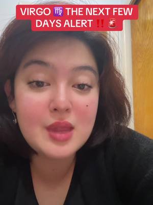 A selfie-style shot of a woman with fair skin, dark brown hair, and red lipstick giving a subtle smile. Overlaid at the top is a red banner with white text that reads, "VIRGO ♍ THE NEXT FEW DAYS ALERT !! 🌟." The background includes a white wall or surface.