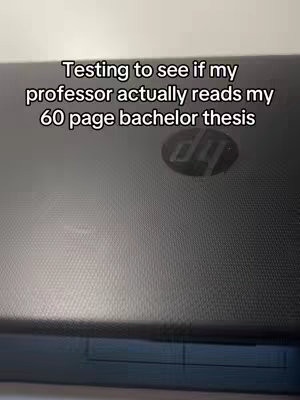The cover image shows a close-up of a black laptop. The text "Testing to see if my professor actually reads my 60 page bachelor thesis" is overlaid in white font..