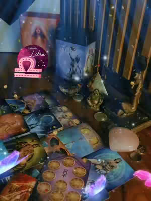 The cover image presents a mystical scene, featuring a wooden table covered with tarot cards, crystals, and figurines. The lighting is dim, creating an ambiance suitable for divination. A logo is placed in the upper corner of the image. The background is blurry with vertical lines.