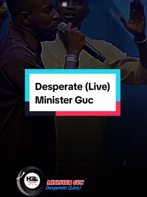 The cover image features two men on a stage, likely during a live performance. The foreground has a rectangular layer with text, a blue and red frame, and a bottom corner logo.