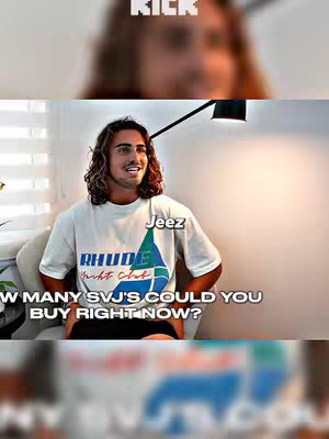 The cover image features a young man with curly brown hair smiling while sitting in a chair indoors. He's wearing a white t-shirt with text. The background consists of blinds. Text overlays add context to the image.
