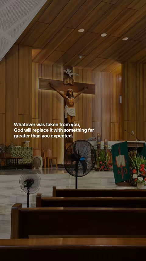 The cover image showcases the interior of a church, viewed from a slightly low angle. The focus is on a large wooden cross with a carving of Jesus on it, positioned above the altar. The background features wood paneling and some soft lighting. In the foreground, there are rows of church pews, and the overall composition is well-lit and serene. In the lower part of the image, there is a quote overlay.