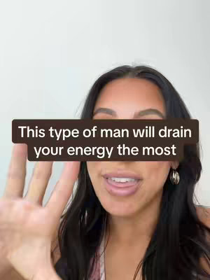 A woman with dark hair and a slight smile is seen from the chest up. A text overlay covers the top portion of the image that sits on top of a blurred white background.