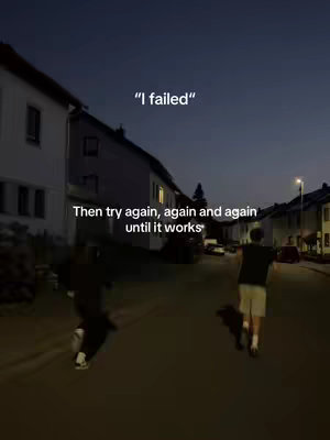 The cover image shows a nighttime street scene with two figures running away from the camera. Above them, overlaid text reads, "I failed". Below, the text continues, "Then try again, again and again until it works". The scene is lit by streetlights and the lights from houses. The composition emphasizes motion and determination.