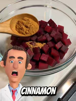 The cover image shows a claymation-style doctor with an open mouth, apparently surprised, in front of a clear bowl filled with diced beets. A wooden spoon holds cinnamon. The text overlay reads 'CINNAMON' in a bold, white, stylized font.