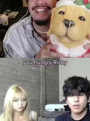 The cover image features a split-screen: the upper half shows a man smiling and holding a dog plushie, the lower half shows two people looking at the camera.