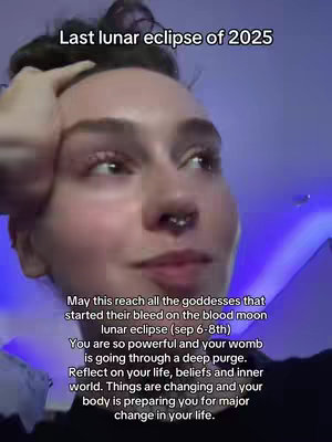 A close-up image of an individual with dark hair and a nose piercing, looking towards the right. Text overlays the top part of the image. The background is dark, with a hint of purple.