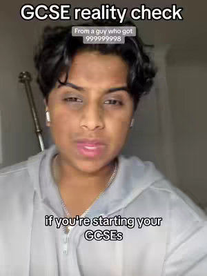 The cover image features a young man with dark hair and brown skin, wearing a light gray hoodie and a silver chain. He is centered in the frame, looking directly at the camera with a serious expression. Text overlays are present at the top and bottom of the image. The background is a plain white wall with a metallic object visible on the left side.