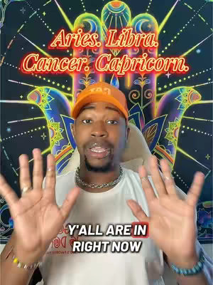 A man wearing an orange hat and a white shirt gestures with both hands, the background behind him is a tapestry of colorful stars and a stylized hand. Text overlays the image in a neon style, and there is text at the bottom with a red background.