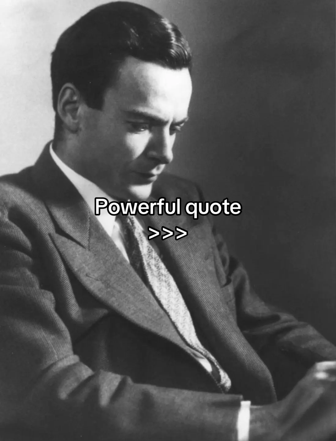 A black and white photo featuring a man in a suit, looking down pensively. Text overlay reads 'Powerful quote' with chevrons.